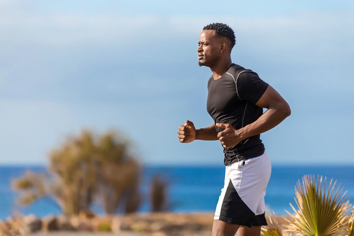 Black african american young man running outdoor