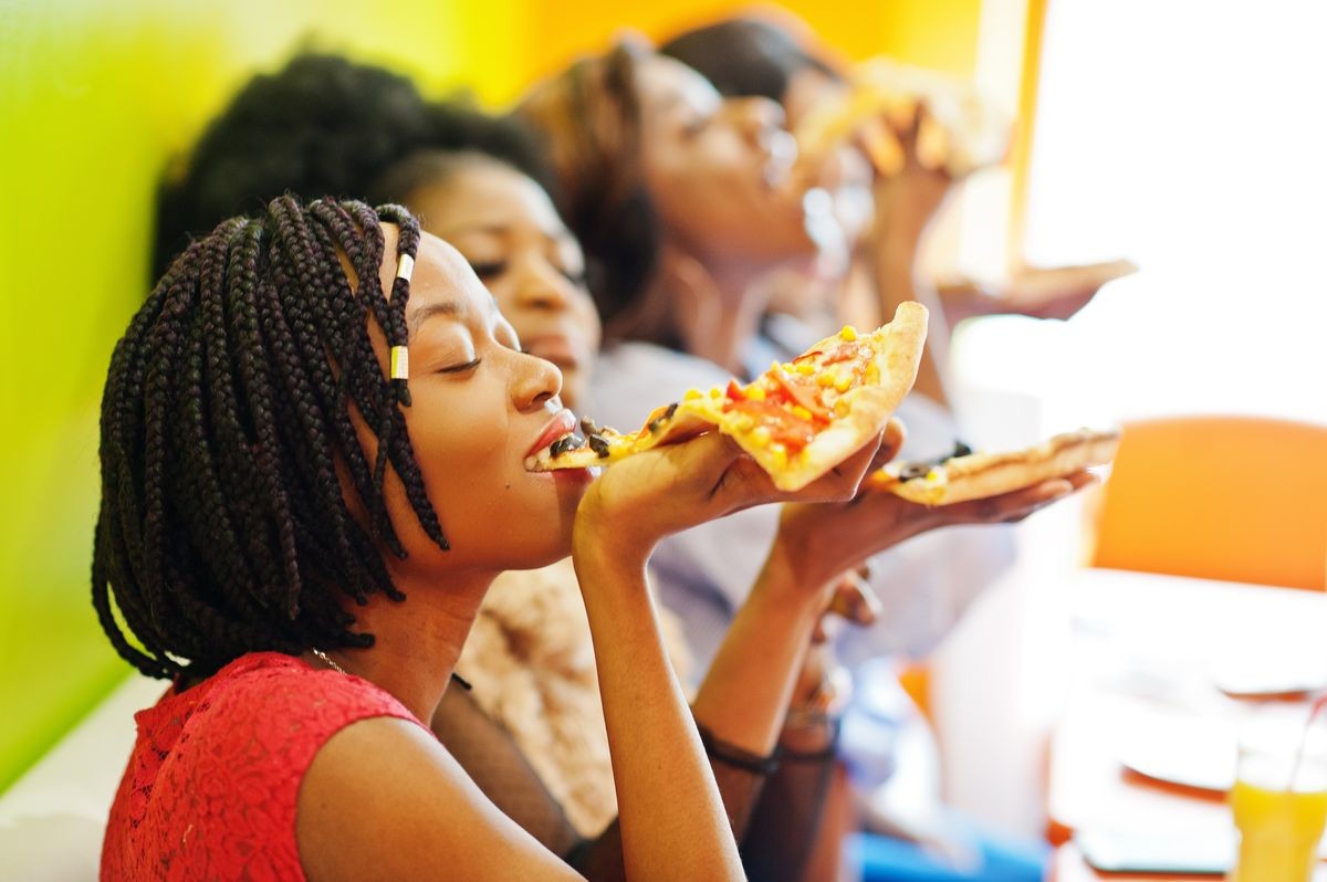 Vicky with her girlfriends on pizza night